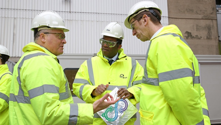 Pictured L-R: Leigh Taylor from Econic Technologies, Energy Minister Kwasi Kwarteng and Drax's vice president for innovation, Jason Shipstone